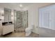 Bathroom featuring stylish vanity and tiled walk-in shower at 200 Hoover Ave # 1905, Las Vegas, NV 89101