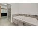 Bathroom with soaking tub and walk-in shower at 200 Hoover Ave # 1905, Las Vegas, NV 89101