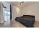 Spacious bedroom adjacent to the living room with city views at 200 Hoover Ave # 1905, Las Vegas, NV 89101