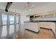 Contemporary kitchen with stainless steel appliances and island open to the living area at 200 Hoover Ave # 1905, Las Vegas, NV 89101