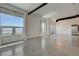 Bright living room featuring concrete floors, city views, and modern light fixture at 200 Hoover Ave # 1905, Las Vegas, NV 89101