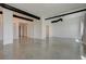 Bright, open living area with concrete floors and industrial ductwork on the ceiling at 200 Hoover Ave # 1905, Las Vegas, NV 89101