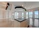 Modern living space boasts concrete floors, island kitchen, and expansive windows with city views at 200 Hoover Ave # 1905, Las Vegas, NV 89101