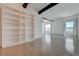 Inviting room with built-in shelving, polished concrete floors, and natural light at 200 Hoover Ave # 1905, Las Vegas, NV 89101