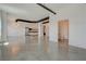 Spacious open-concept living room featuring modern kitchen and concrete floors at 200 Hoover Ave # 1905, Las Vegas, NV 89101