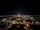 Striking nighttime aerial view of the illuminated city skyline, offering a mesmerizing urban panorama at 200 Hoover Ave # 1905, Las Vegas, NV 89101