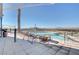 Rooftop pool with lounge chairs features amazing city views, including the Stratosphere Tower at 200 Hoover Ave # 1905, Las Vegas, NV 89101