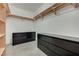 Spacious walk-in closet with custom shelving, drawers, and ample storage space at 200 Hoover Ave # 1905, Las Vegas, NV 89101