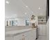 Stylish bar area featuring white cabinetry and marble countertops at 21 Sawgrass Ct, Las Vegas, NV 89113
