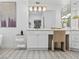 Bright bathroom featuring a soaking tub, vanity and stylish tile flooring at 21 Sawgrass Ct, Las Vegas, NV 89113