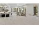 Open dining room with modern table, chairs and large windows at 21 Sawgrass Ct, Las Vegas, NV 89113