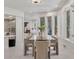 Bright dining room with a glass-top table and sleek chairs at 21 Sawgrass Ct, Las Vegas, NV 89113