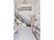 Inviting entryway featuring a grand staircase and gleaming marble flooring at 21 Sawgrass Ct, Las Vegas, NV 89113