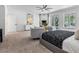 Serene main bedroom showcases a stylish fireplace, comfortable seating, and a luxurious king-size bed at 21 Sawgrass Ct, Las Vegas, NV 89113