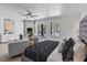 Bright main bedroom featuring a fireplace, sitting area, and outdoor access at 21 Sawgrass Ct, Las Vegas, NV 89113