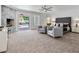 Bright main bedroom featuring a fireplace, comfortable seating, and direct access to a private outdoor retreat at 21 Sawgrass Ct, Las Vegas, NV 89113