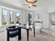 Inviting home office featuring natural light, stylish desk, and modern decor elements at 21 Sawgrass Ct, Las Vegas, NV 89113
