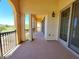 Spacious outdoor balcony showcasing decorative columns and wrought iron railings at 21 Via Visione # 206, Henderson, NV 89011