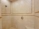 Tile shower featuring diamond pattern tile and shower head at 21 Via Visione # 206, Henderson, NV 89011