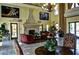 Grand lobby with high ceilings, fireplace, elegant chandelier, and ornate decor at 21 Via Visione # 206, Henderson, NV 89011
