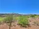 Expansive landscape view with desert vegetation and rolling hills in the background at 21 Via Visione # 206, Henderson, NV 89011