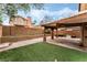 Spacious backyard with a covered patio and low-maintenance landscaping at 2307 Tuscarora Ct, Las Vegas, NV 89142