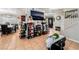 Open-concept living room with tile flooring, dining area, and modern decor at 2307 Tuscarora Ct, Las Vegas, NV 89142