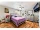 Serene main bedroom featuring hardwood floors, a ceiling fan, and a relaxing color scheme at 2307 Tuscarora Ct, Las Vegas, NV 89142
