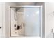 Clean shower with glass sliding door, and neutral color scheme at 2307 Tuscarora Ct, Las Vegas, NV 89142