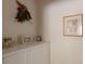 Entryway featuring a hallway with decorative items, storage, and a bright, neutral color scheme at 2383 Thayer Ave, Henderson, NV 89074