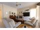Comfortable living room with fireplace and built-in entertainment center at 2383 Thayer Ave, Henderson, NV 89074