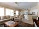 Spacious living room with comfortable seating and an open floor plan to the kitchen at 2383 Thayer Ave, Henderson, NV 89074