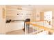 Well lit office space featuring built in shelving, white drawers, and space for two at 2383 Thayer Ave, Henderson, NV 89074