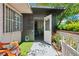 Charming entryway with open door, brick accents, and inviting walkway at 2479 Domingo St, Las Vegas, NV 89121