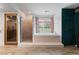 Bathroom featuring a soaking tub, glass-enclosed shower, and updated fixtures at 2479 Domingo St, Las Vegas, NV 89121