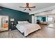 Comfortable main bedroom featuring a ceiling fan, spacious layout, and ample closet space at 2479 Domingo St, Las Vegas, NV 89121
