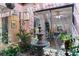 Charming patio with a water fountain and lush greenery, creating a serene outdoor space at 2479 Domingo St, Las Vegas, NV 89121
