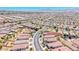 Aerial view of 2501 Celestial Light Dr in a desert community with mountain views at 2501 Celestial Light Dr, Henderson, NV 89044