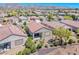 A high-angle shot shows the neighborhood and the surrounding desert landscape at 2501 Celestial Light Dr, Henderson, NV 89044