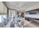 Bright dining area with modern furnishings, built-in wine rack, and window seating at 2501 Celestial Light Dr, Henderson, NV 89044