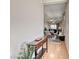 Hallway featuring hardwood floors, leading into a dining and living area at 2501 Celestial Light Dr, Henderson, NV 89044