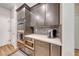 A stylish kitchen features stainless steel built-in appliances, modern cabinetry, and a tiled backsplash at 2501 Celestial Light Dr, Henderson, NV 89044