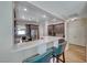 Eat-in kitchen featuring stainless appliances, peninsula bar, and ample cabinet storage at 2501 Celestial Light Dr, Henderson, NV 89044