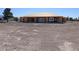 New home under construction with a wooden frame and desert landscaping at 2561 Red Rock Dr, Pahrump, NV 89048