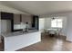 Modern kitchen features sleek cabinetry, marble countertops, and an adjacent dining area at 2561 Red Rock Dr, Pahrump, NV 89048