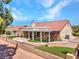 Charming home featuring a quaint backyard with a pergola-covered patio and low maintenance landscaping at 2829 Golf Links Dr, Las Vegas, NV 89134