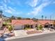 Stunning single-story home with a red tile roof, well-maintained landscaping, and mountain views at 2829 Golf Links Dr, Las Vegas, NV 89134