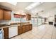 Kitchen featuring granite countertops and tile flooring with large windows to outdoor view at 2829 Golf Links Dr, Las Vegas, NV 89134
