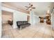Spacious living room with access to kitchen and cozy seating, providing a welcoming atmosphere at 2829 Golf Links Dr, Las Vegas, NV 89134