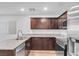 Well-equipped kitchen with stainless steel appliances, granite counters, and ample cabinet space at 2846 Cerulean Stars Ln # 1, Las Vegas, NV 89183